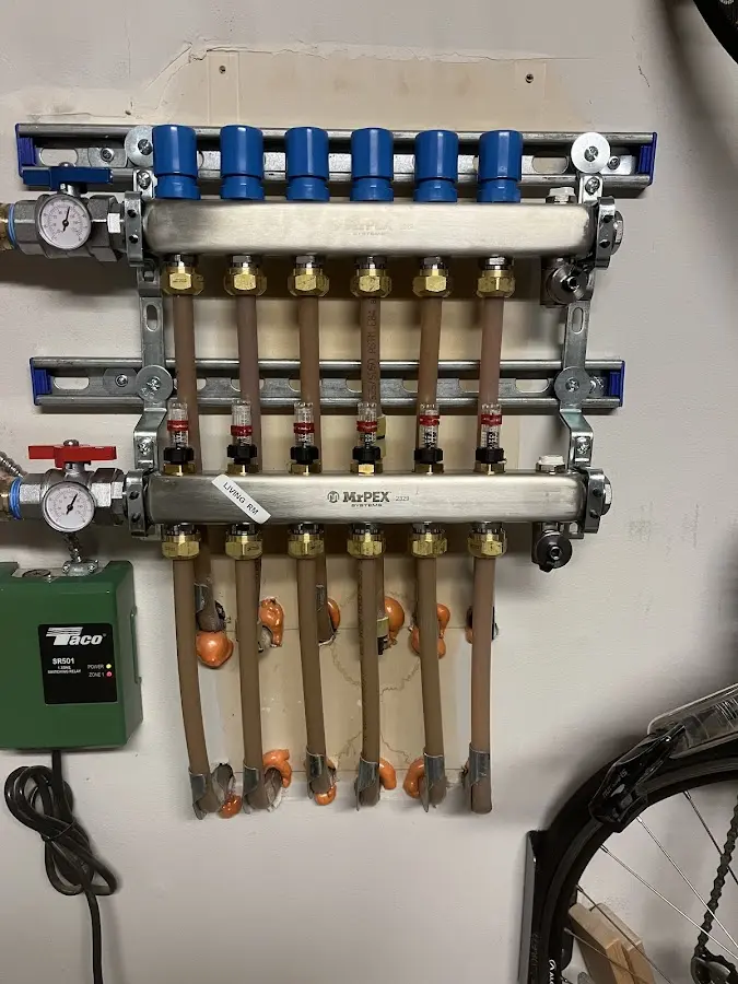 Plumber performing Gas Line Installation at a residential property in Grand Ledge